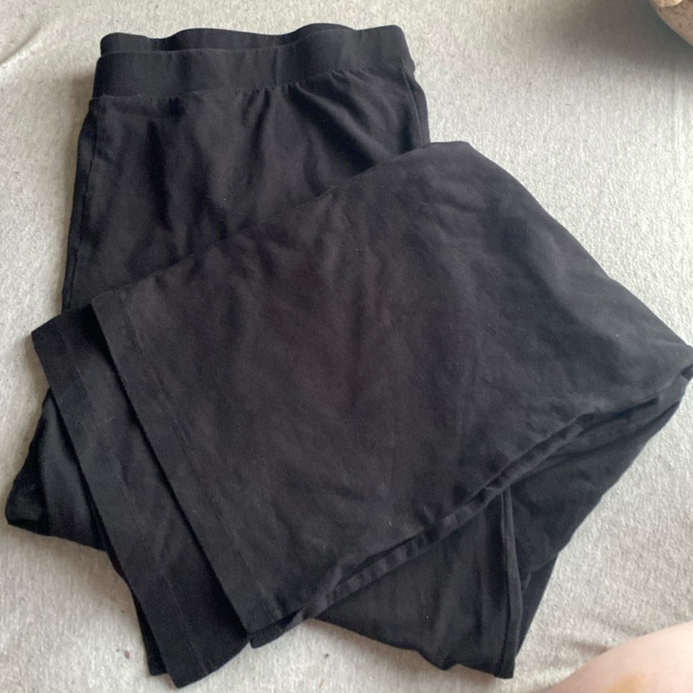 Super cute basic black plus size flare leggings, with slits on sides!